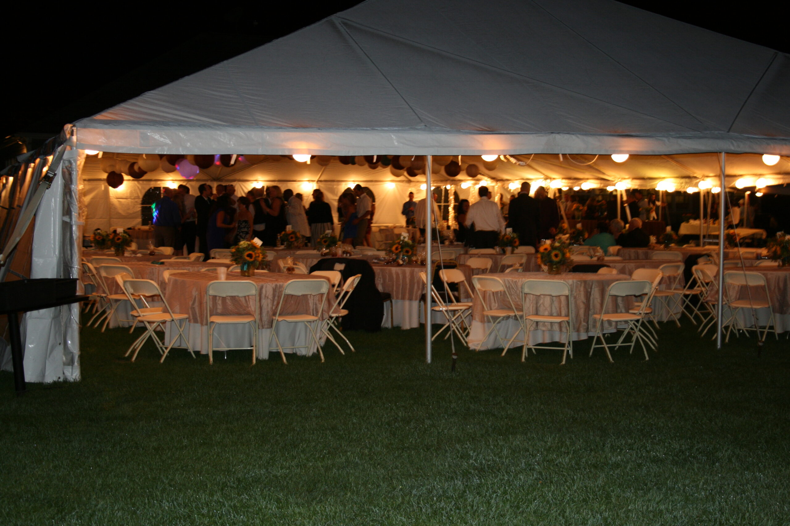 Tent with people inside and tables