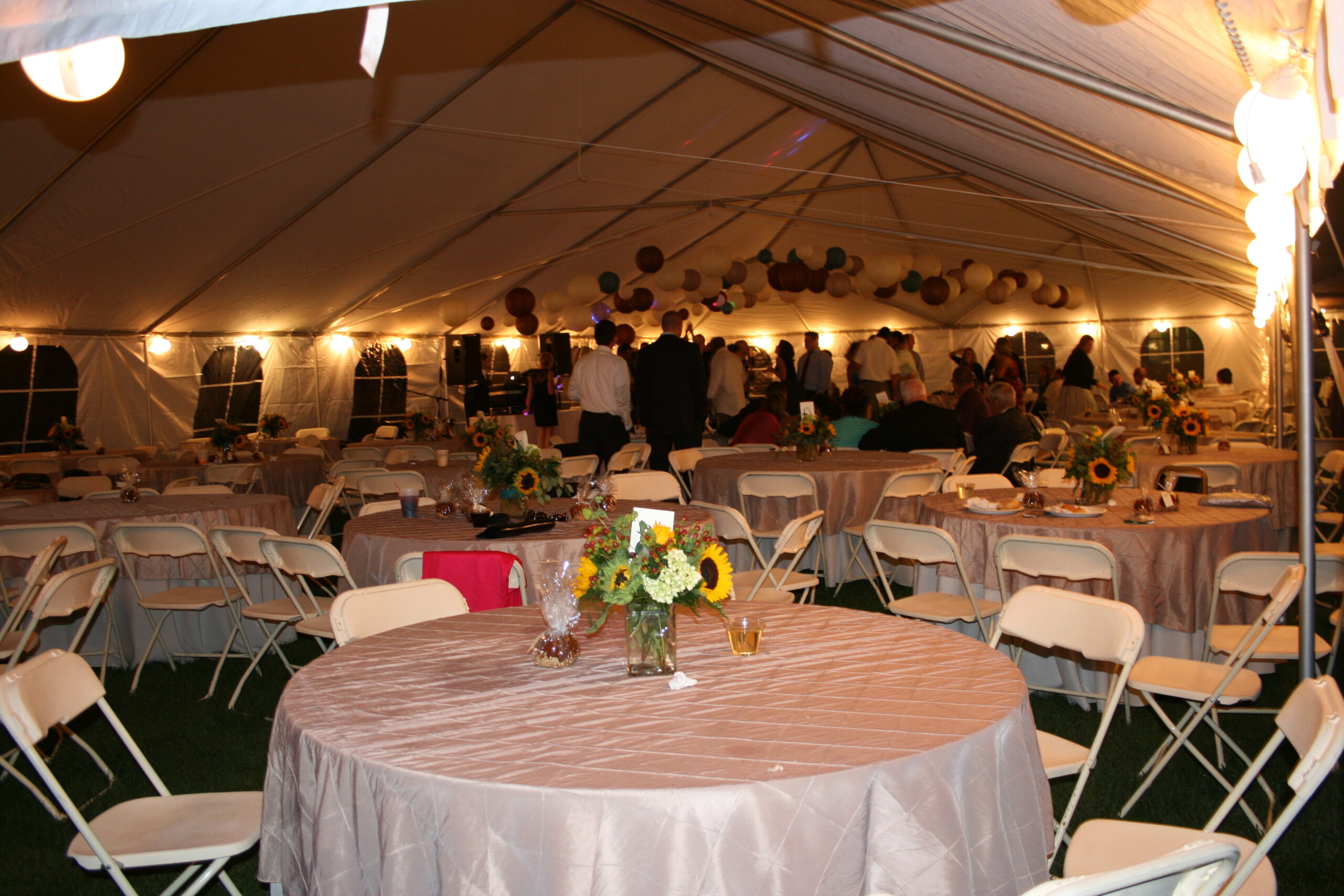 Tent with people celebrating inside